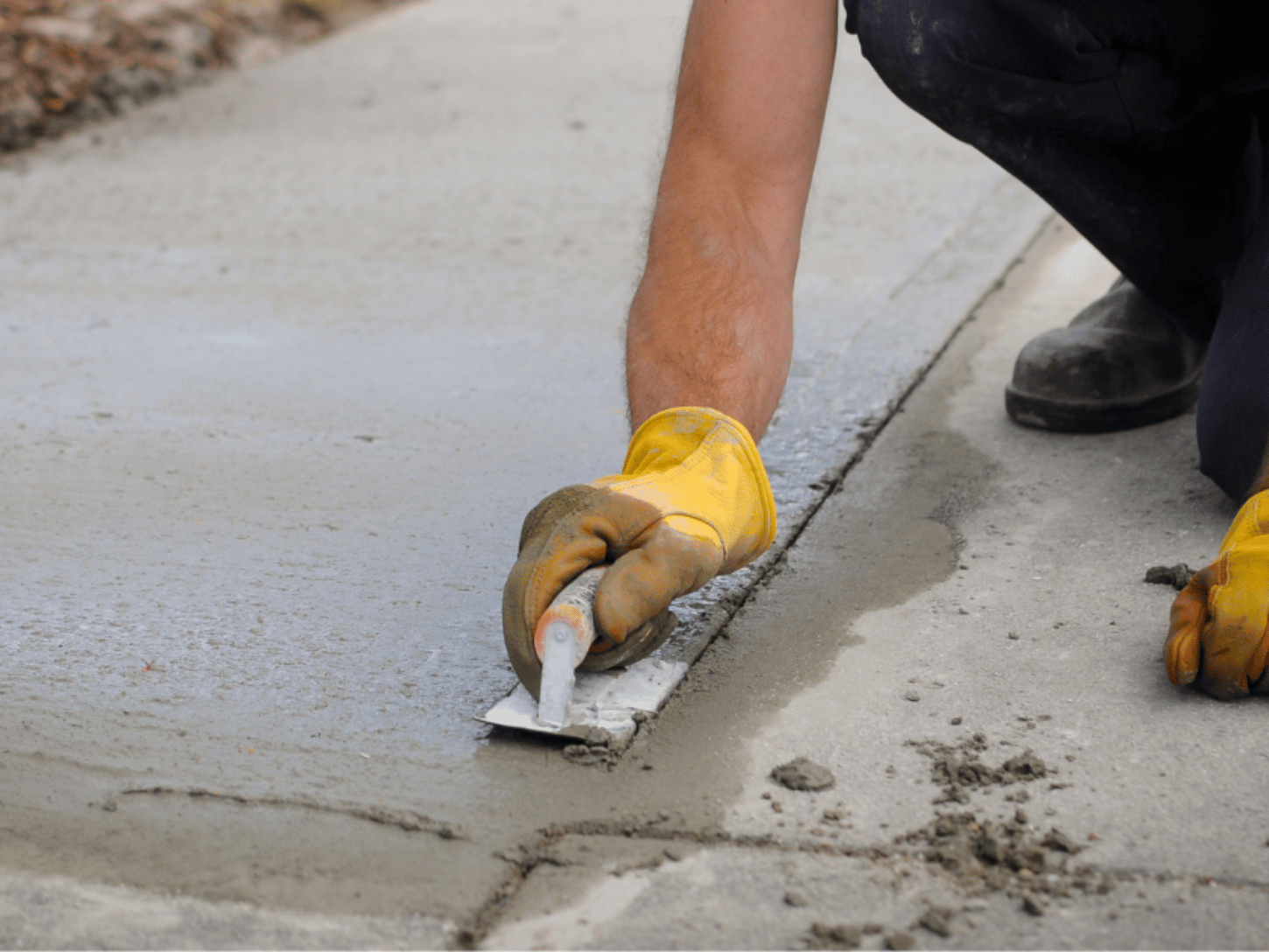 RPM Outdoor Living experts during a concrete work